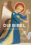 Ein aufrecht stehendes Buch mit goldfarbenem Buchschnitt zeigt auf dem Einband eine farbige Illustration eines Engels mit Heiligenschein, Flügeln und langem, blauem Gewand. Der Engel hält eine Kette mit einem Weihrauchfass, aus dem Rauch aufsteigt. Im oberen Bereich ist ein stilisiertes Symbol abgebildet. Im mittleren Bereich steht in großen weißen Buchstaben der Titel 'DIE BIBEL', darunter in kleinerer Schrift 'Einheitsübersetzung'.